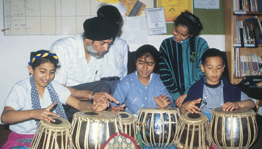 Gurmit Ji teaching a school class
